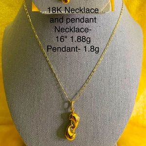 18K yellow gold necklace with dolphin pendant. 16" long